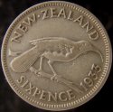 1933_New_Zealand_Sixpence.JPG